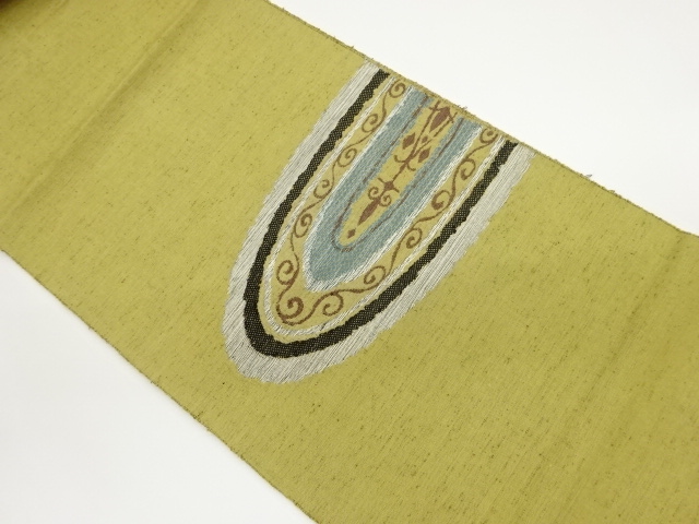 手織り紬丸に唐草模様織出し名古屋帯